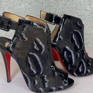 Christian Louboutin ankle strap booties (black & silver).
